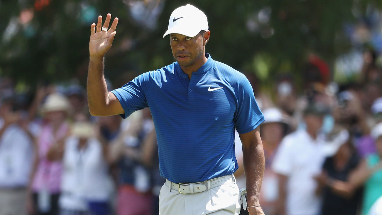 ST LOUIS, MO - AUGUST 11: Tiger Woods of the United States acknowledges the crowd after making a putt for birdie on the sixth green during the third round of the 2018 PGA Championship at Bellerive Country Club on August 11, 2018 in St Louis, Missouri.