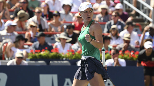 MONTREAL, QC - AUGUST 12: Simona Halep of Romania reacts after taking the first set 7-6 in a tie break against Sloane Stephens in the final during day seven of the Rogers Cup at IGA Stadium on August 12, 2018 in Montreal, Quebec, Canada.