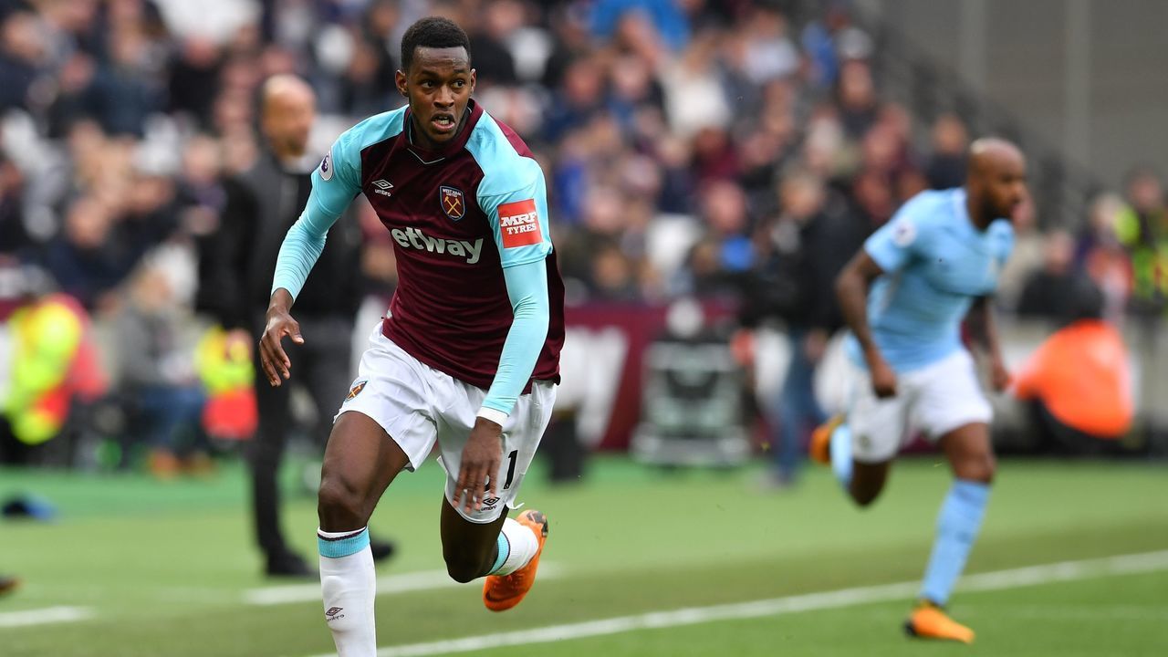 West Ham United's Swiss midfielder Edimilson Fernandes runs with the ball during the English Premier League football match between West Ham United and Manchester City at The London Stadium, in east London on April 29, 2018.