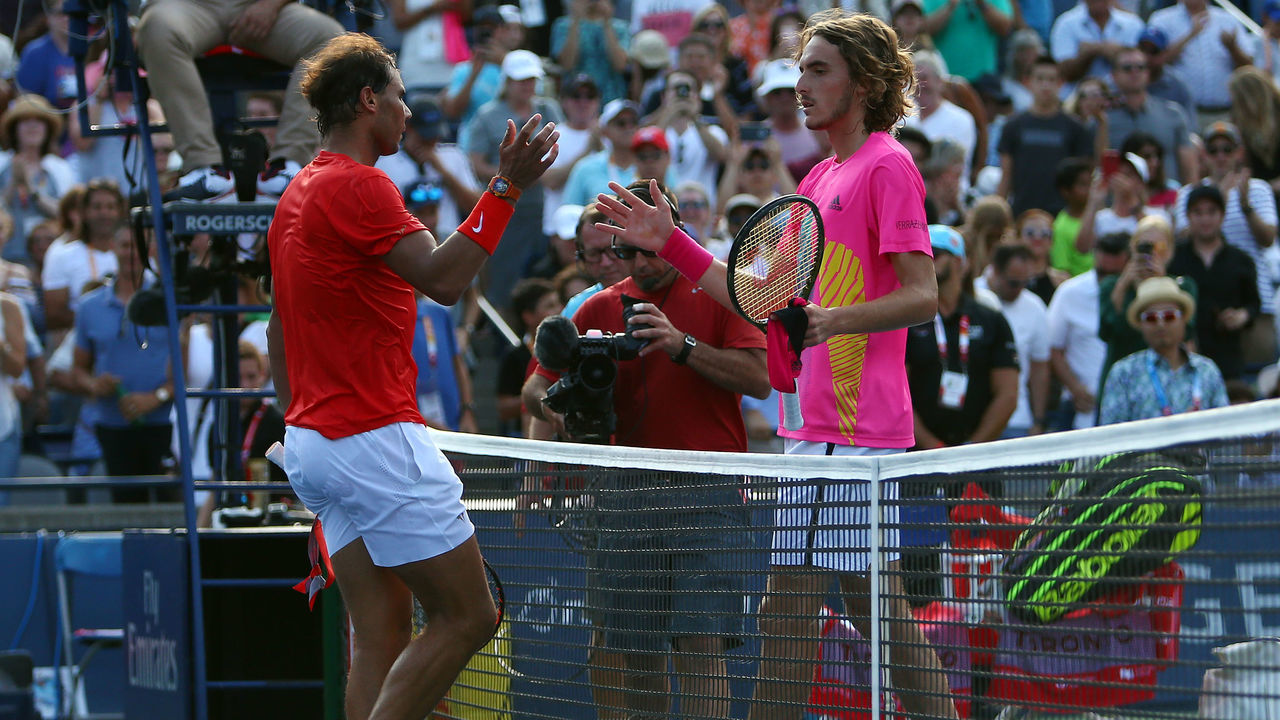 TORONTO, ON - AUGUST 12: Rafael Nadal of Spain is congratulated by Stefanos Tsitsipas of Greece following the final match on Day 7 of the Rogers Cup at Aviva Centre on August 12, 2018 in Toronto, Canada.