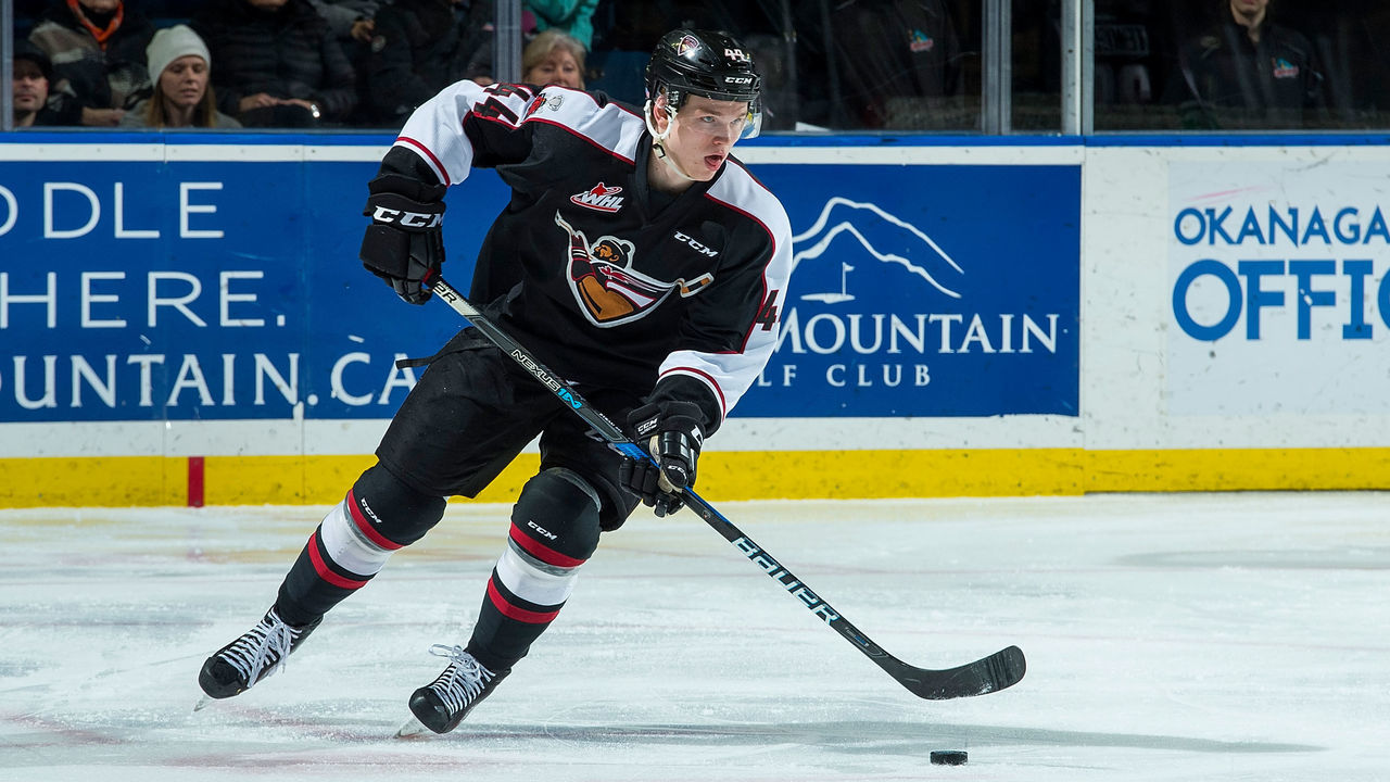 KELOWNA, BC - FEBRUARY 7: Bowen Byram #44 of the Vancouver Giants skates with the puck against the Kelowna Rockets at Prospera Place on February 7, 2018 in Kelowna, Canada.