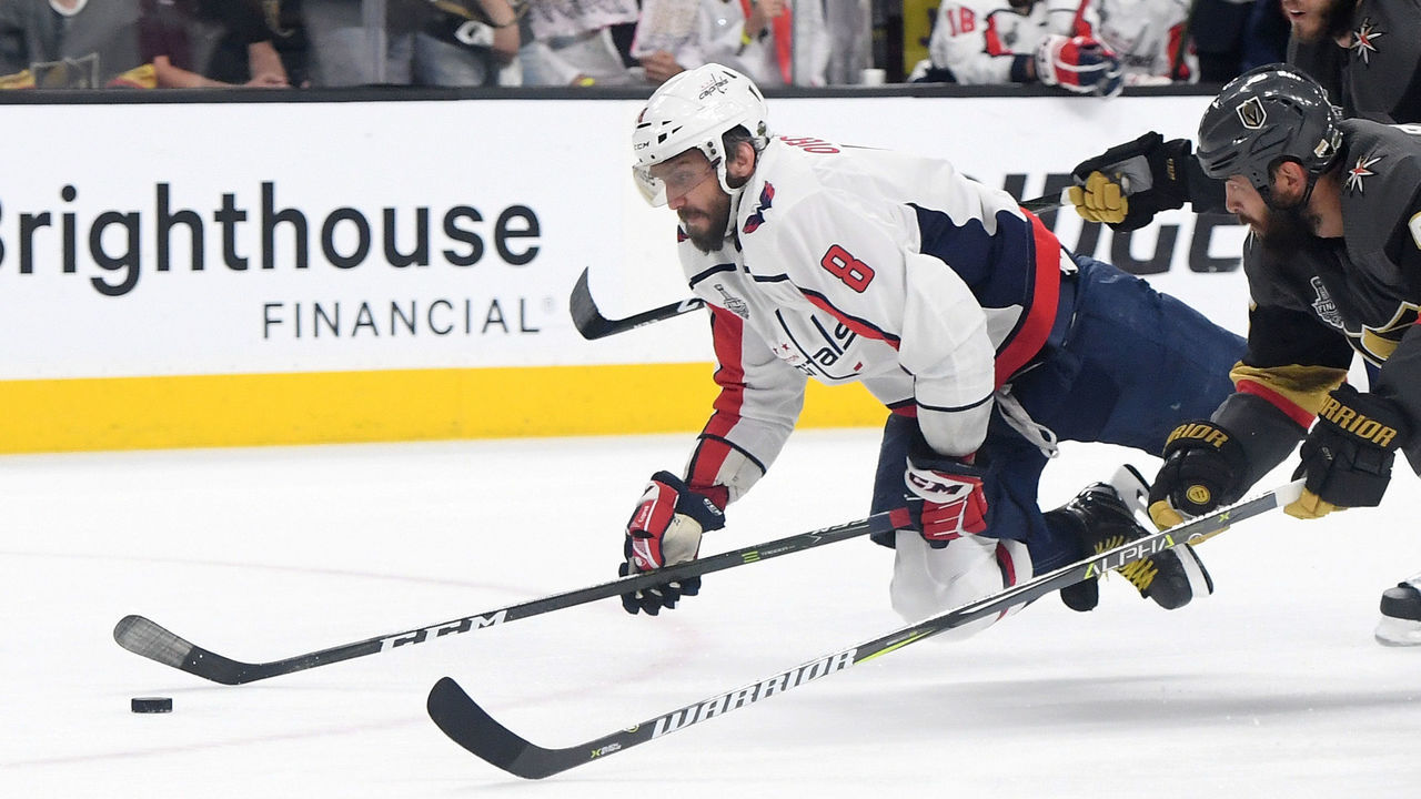 LAS VEGAS, NV - JUNE 07: Alex Ovechkin #8 of the Washington Capitals gets tripped up against the Vegas Golden Knights during the second period in Game Five of the 2018 NHL Stanley Cup Final at T-Mobile Arena on June 7, 2018 in Las Vegas, Nevada.