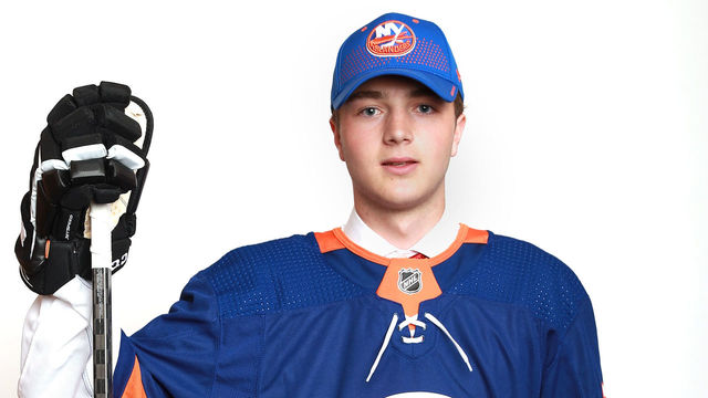 DALLAS, TX - JUNE 22: Noah Dobson poses after being selected twelfth overall by the New York Islanders during the first round of the 2018 NHL Draft at American Airlines Center on June 22, 2018 in Dallas, Texas.
