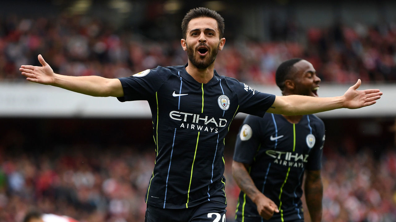 LONDON, ENGLAND - AUGUST 12: Bernardo Silva of Manchester City celebrates scoring his team's second goal during the Premier League match between Arsenal FC and Manchester City at Emirates Stadium on August 12, 2018 in London, United Kingdom.