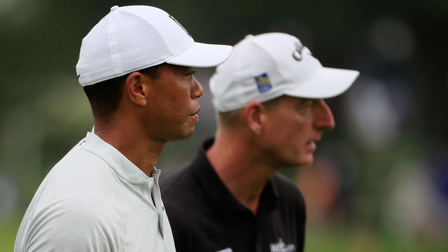 ST. LOUIS, MO - AUGUST 07: (L-R) Tiger Woods of the United States and Jim Furyk of the United States walk together on the first hole during a practice round prior to the 2018 PGA Championship at Bellerive Country Club on August 7, 2018 in St. Louis, Missouri.
