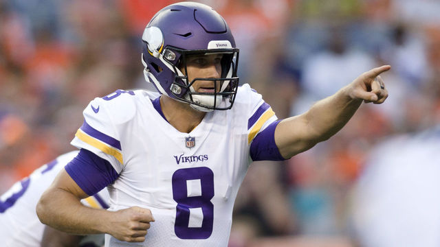DENVER, CO - AUGUST 11: Minnesota Vikings quarterback Kirk Cousins (8) points during the Denver Broncos vs. Minnesota Vikings preseason game on August 11, 2018 at Broncos Stadium at Mile High in Denver, CO.