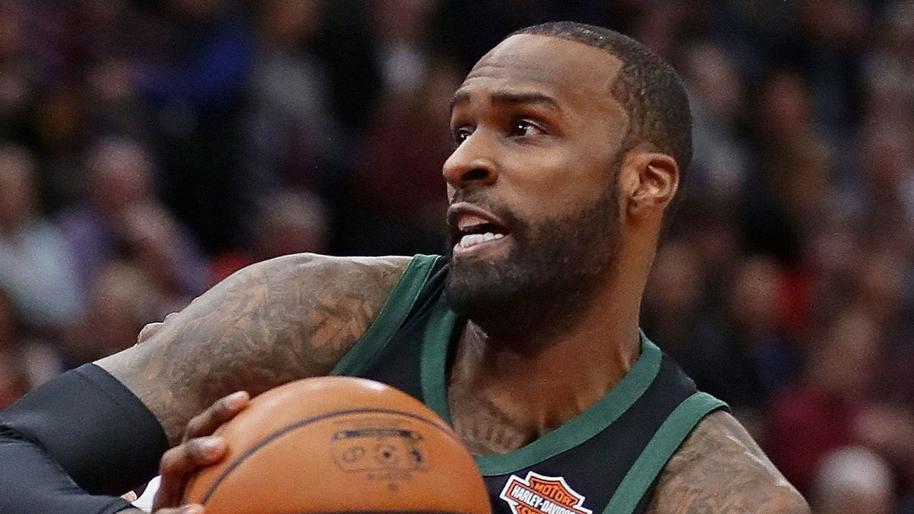 CHICAGO, IL - MARCH 23: Shabazz Muhammad #15 of the Milwaukee Bucks drives against David Nwaba #11 of the Chicago Bulls at the United Center on March 23, 2018 in Chicago, Illinois.