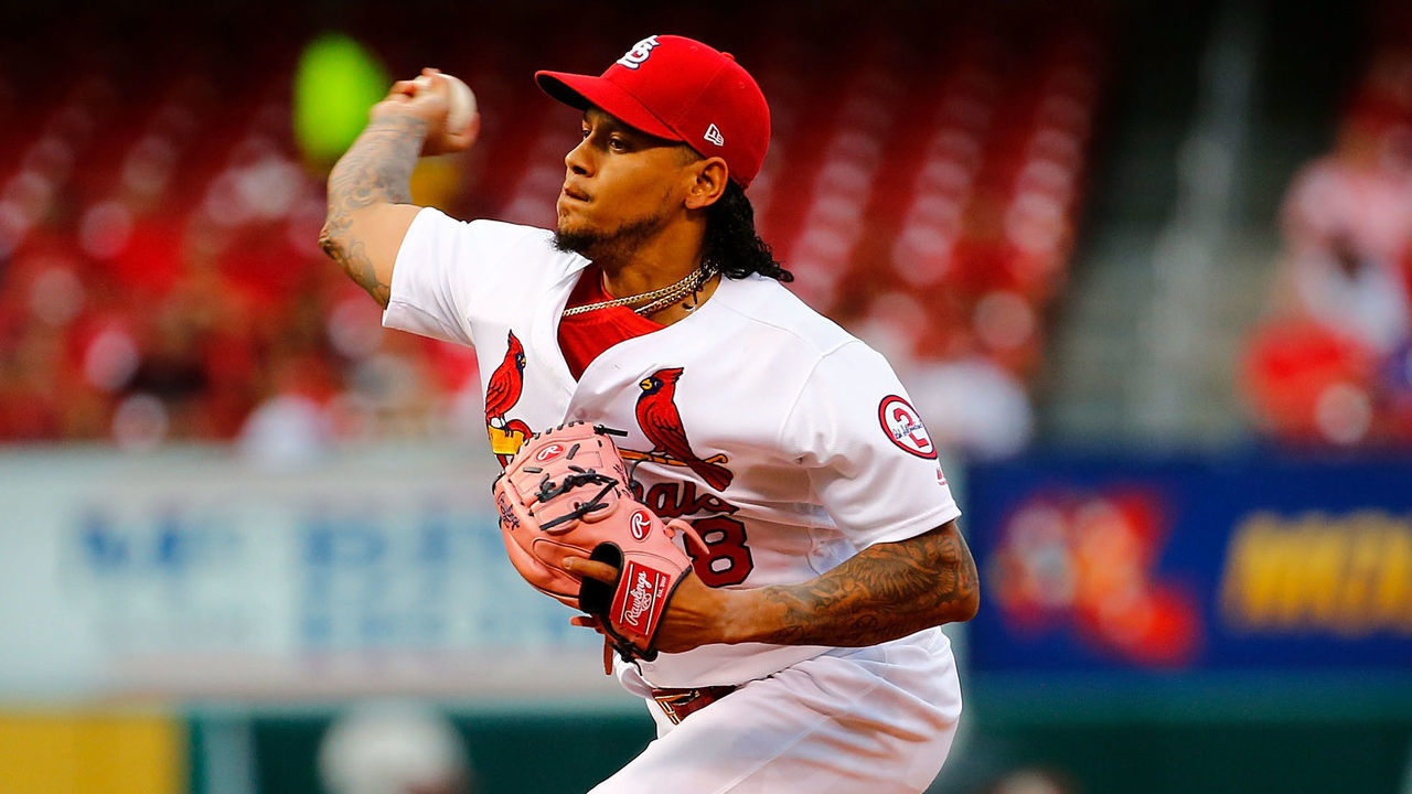 ST. LOUIS, MO - JULY 30: Carlos Martinez #18 of the St. Louis Cardinals delivers a pitch against the Colorado Rockies in the first inning at Busch Stadium on July 30, 2018 in St. Louis, Missouri.