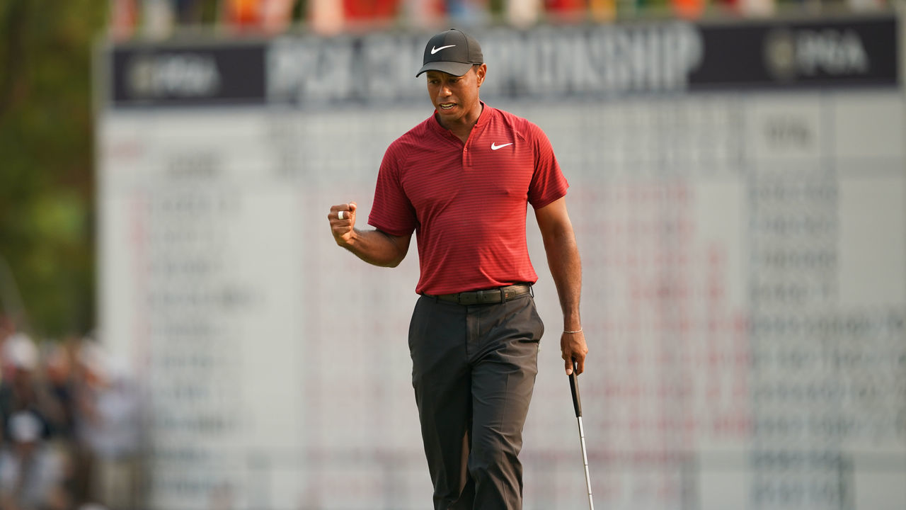 ST. LOUIS, MO - August 12: Tiger Woods of the US reacts to making his putt for birdie on the 18th hole during the final round of the 100th PGA Championship held at Bellerive Golf Club on August 12, 2018 in St. Louis, Missouri.