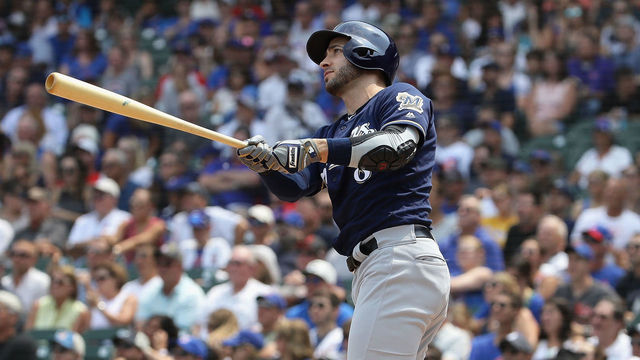CHICAGO, IL - AUGUST 14: Ryan Braun #8 of the Milwaukee Brewers follows the flight of his two run home run in the 1st inning against the Chicago Cubs at Wrigley Field on August 14, 2018 in Chicago, Illinois.