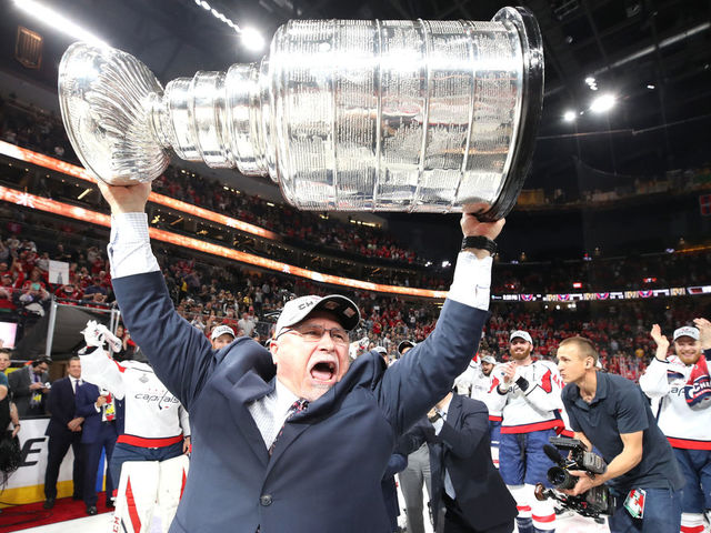 LAS VEGAS, NV - JUNE 07: Head coach Barry Trotz of the Washington Capitals hoists the Stanley Cup after his team defeated the Vegas Golden Knights 4-3 in Game Five of the 2018 NHL Stanley Cup Final at T-Mobile Arena on June 7, 2018 in Las Vegas, Nevada.