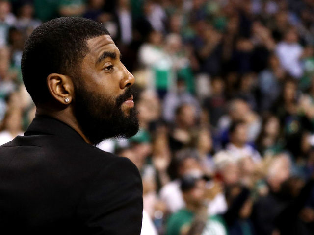 BOSTON, MA - MAY 9: Kyrie Irving #11 of the Boston Celtics looks on before Game Five against the Philadelphia 76ers in the Eastern Conference Second Round of the 2018 NBA Playoffs at TD Garden on May 9, 2018 in Boston, Massachusetts.