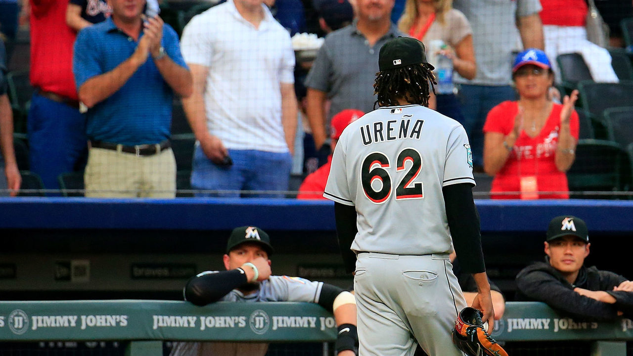 ATLANTA, GA - AUGUST 15: Jose Urena #62 of the Miami Marlins walks off the field after being ejected during the first inning against the Atlanta Braves at SunTrust Park on August 15, 2018 in Atlanta, Georgia.