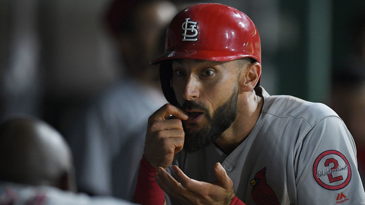 PITTSBURGH, PA - AUGUST 04: Matt Carpenter #13 of the St. Louis Cardinals reacts in the dugout with Marcell Ozuna #23 after hitting a solo home run in ninth inning during the game against the Pittsburgh Pirates at PNC Park on August 4, 2018 in Pittsburgh, Pennsylvania.