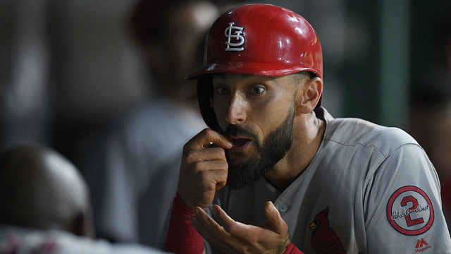 PITTSBURGH, PA - AUGUST 04: Matt Carpenter #13 of the St. Louis Cardinals reacts in the dugout with Marcell Ozuna #23 after hitting a solo home run in ninth inning during the game against the Pittsburgh Pirates at PNC Park on August 4, 2018 in Pittsburgh, Pennsylvania.
