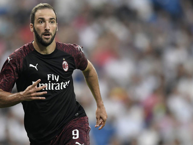 AC Milan's Argentinian forward Gonzalo Higuain runs during the Santiago Bernabeu Trophy football match between Real Madrid and AC Milan in Madrid on August 11, 2018.