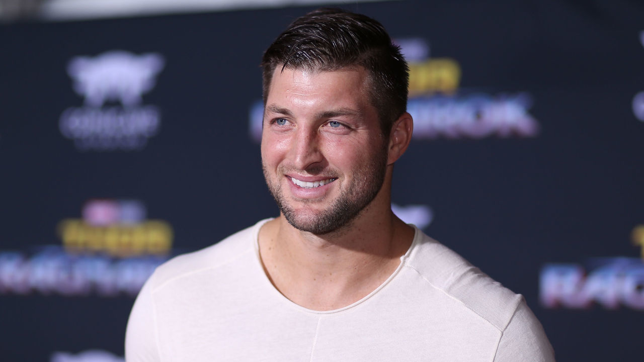 HOLLYWOOD, CA - OCTOBER 10: Professional football player Tim Tebow at The World Premiere of Marvel Studios' 'Thor: Ragnarok' at the El Capitan Theatre on October 10, 2017 in Hollywood, California.