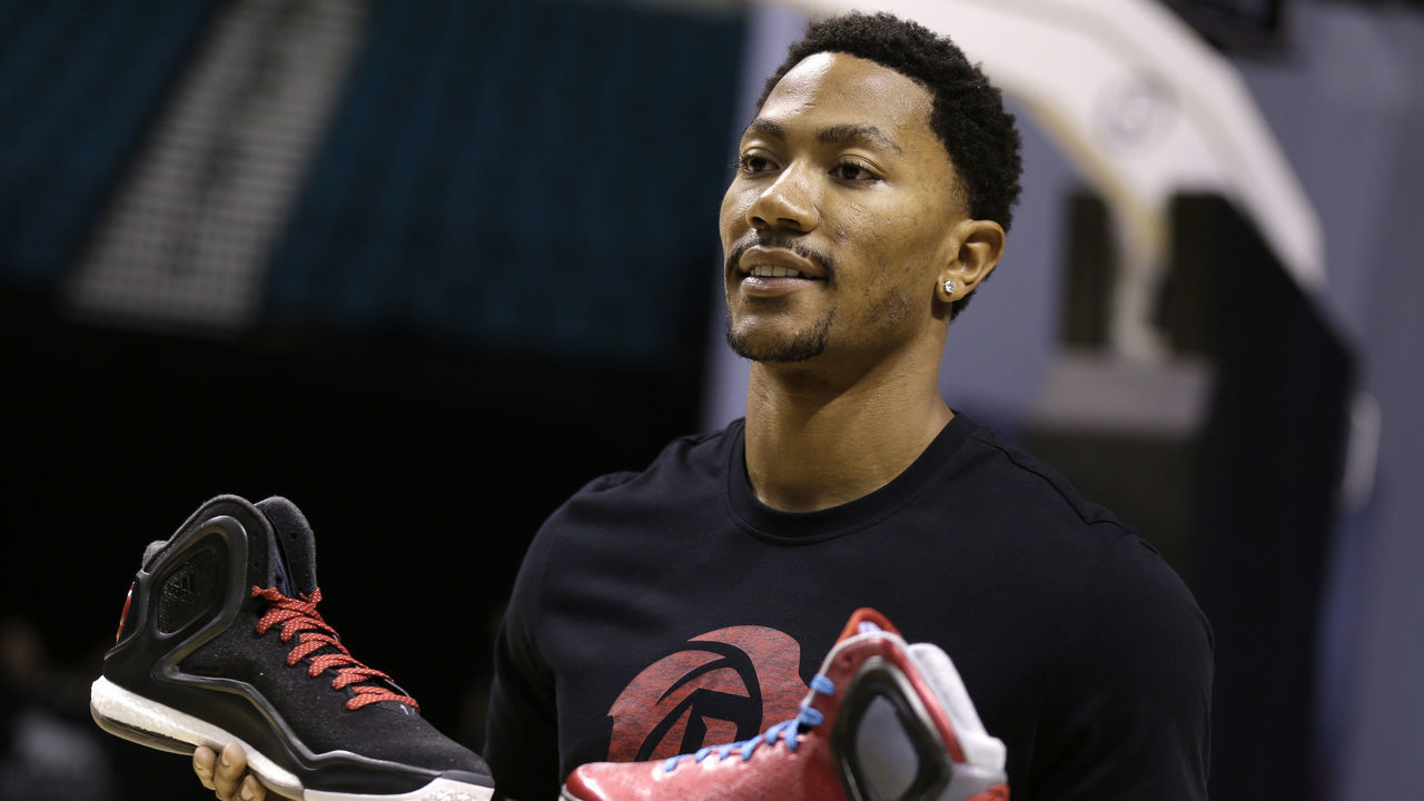 LAS VEGAS, NV - JULY 27: Derrick Rose of the Chicago Bulls shows off the new adidas D Rose 5 Boost during the Adidas BOOST Basketball Launch inside the MGM Grand Garden Arena in Las Vegas on July 27, 2014 in Las Vegas, Nevada.