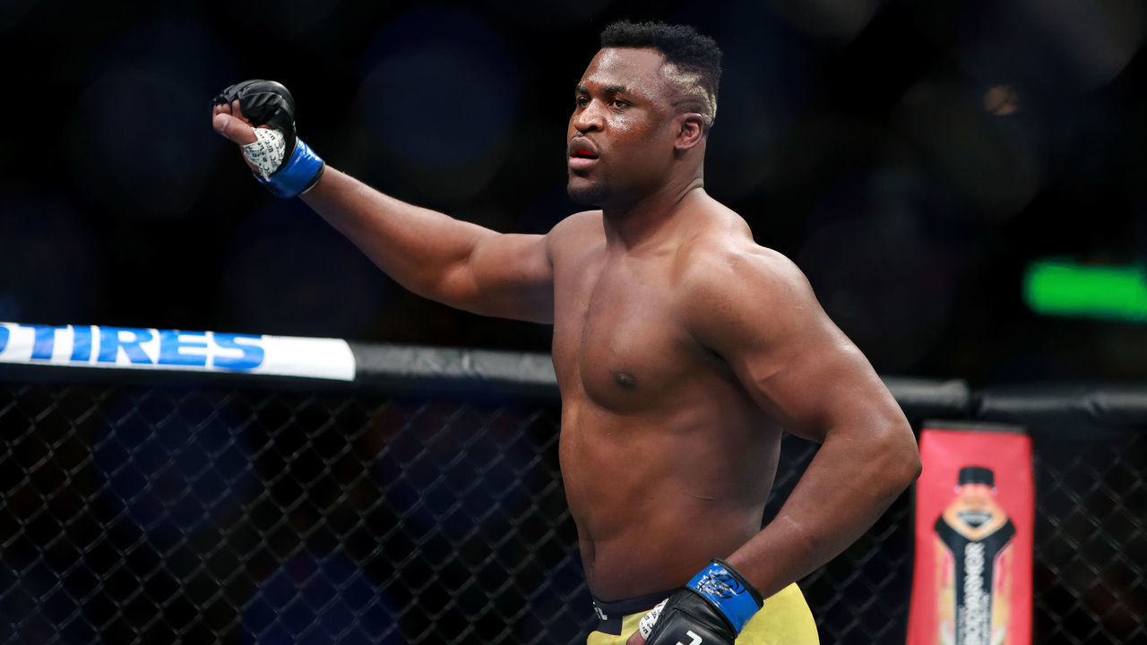 BOSTON, MA - JANUARY 20: Francis Ngannou enters the octagon for his fight against Stipe Miocic in their Heavyweight Championship fight during UFC 220 at TD Garden on January 20, 2018 in Boston, Massachusetts.