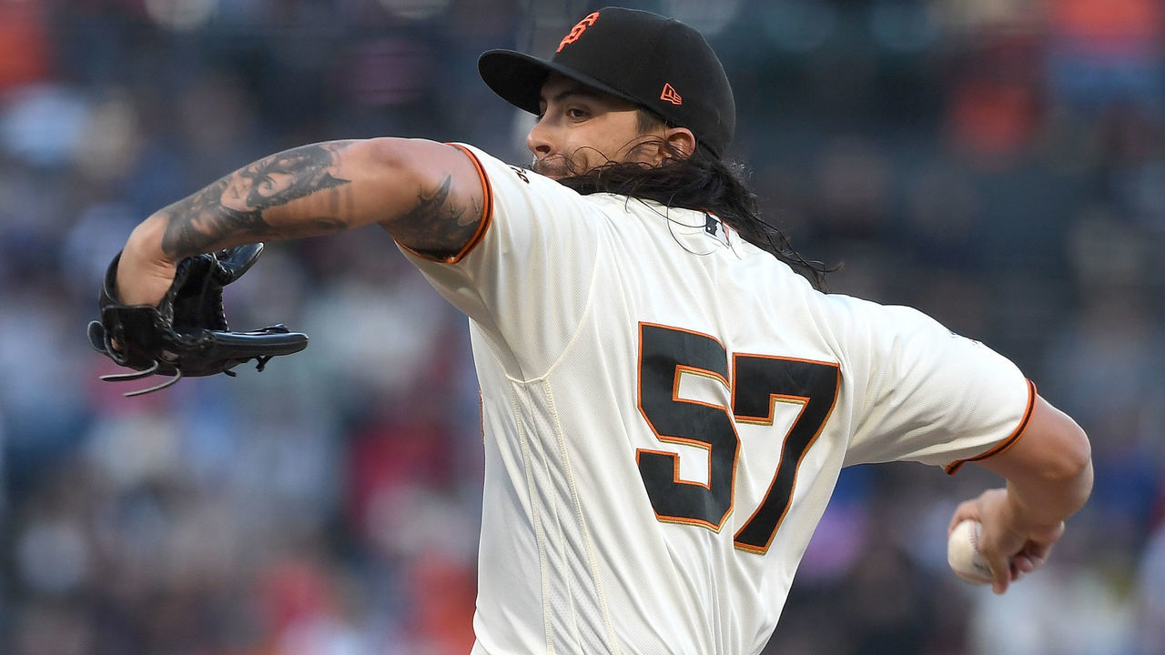 SAN FRANCISCO, CA - AUGUST 06: Dereck Rodriguez #57 of the San Francisco Giants pitches against the Houston Astros in the top of the first inning at AT&T Park on August 6, 2018 in San Francisco, California.