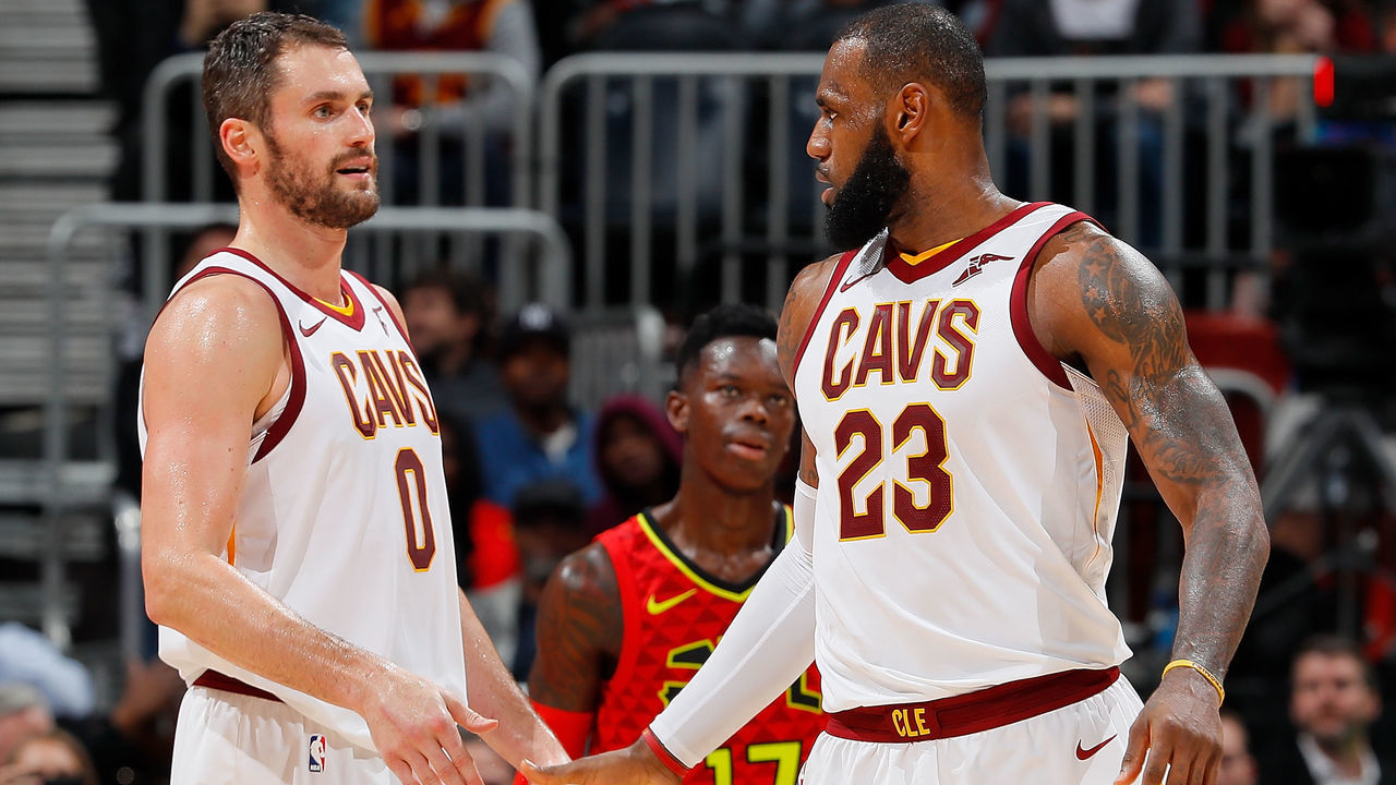 ATLANTA, GA - NOVEMBER 30: LeBron James #23 of the Cleveland Cavaliers reacts with Kevin Love #0 after drawing a foul against the Atlanta Hawks at Philips Arena on November 30, 2017 in Atlanta, Georgia.