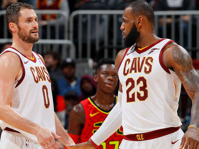 ATLANTA, GA - NOVEMBER 30: LeBron James #23 of the Cleveland Cavaliers reacts with Kevin Love #0 after drawing a foul against the Atlanta Hawks at Philips Arena on November 30, 2017 in Atlanta, Georgia.