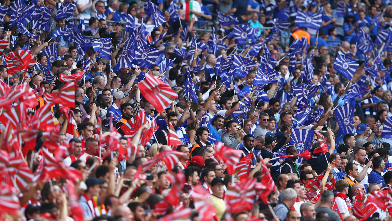 LONDON, ENGLAND - MAY 27: Arsenal and Chelsea fans enjoy the pre match atmosphere prior to The Emirates FA Cup Final between Arsenal and Chelsea at Wembley Stadium on May 27, 2017 in London, England.