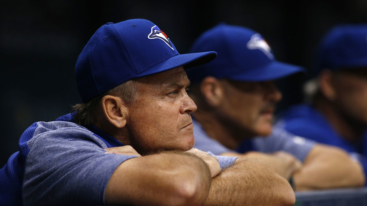 ST. PETERSBURG, FL - JUNE 11: Manager John Gibbons #5 of the Toronto Blue Jays looks on from the dugout during the third inning of a game against the Tampa Bay Rays on June 11, 2018 at Tropicana Field in St. Petersburg, Florida.