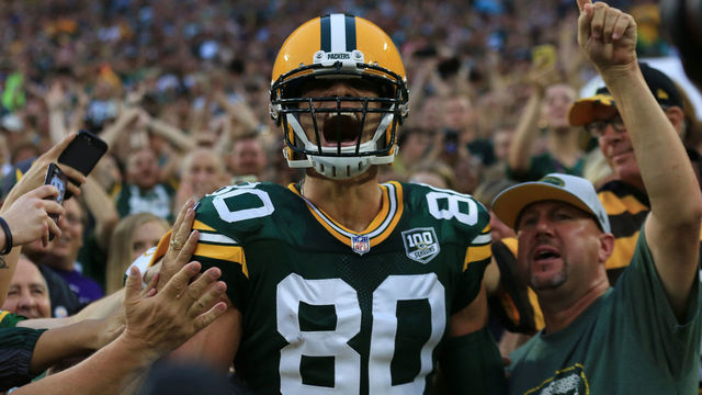 GREEN BAY, WI - AUGUST 16: Green Bay Packers tight end Jimmy Graham (80) celebrates with his first Lambeau Leap during a preseason game between the Green Bay Packers and the Pittsburgh Steelers on August 16, 2018, at Lambeau Field in Green Bay, WI.