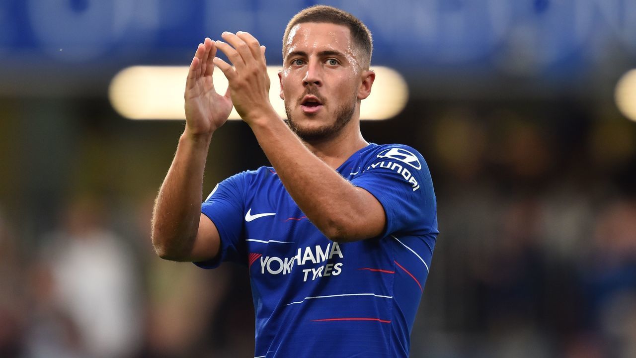 Chelsea's Belgian midfielder Eden Hazard applauds supporters on the pitch after the English Premier League football match between Chelsea and Arsenal at Stamford Bridge in London on August 18, 2018. - Chelsea won the game 3-2.