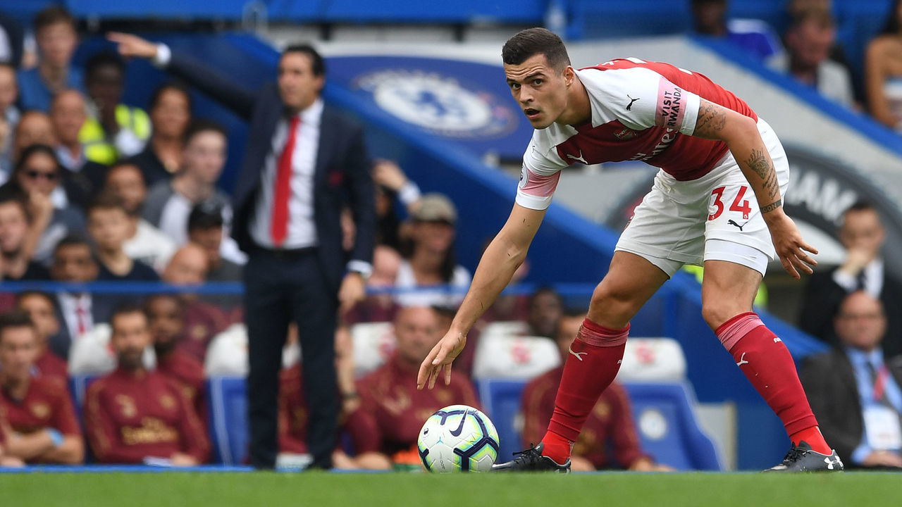 LONDON, ENGLAND - AUGUST 18: Granit Xhaka of Arsenal in action during the Premier League match between Chelsea FC and Arsenal FC at Stamford Bridge on August 18, 2018 in London, United Kingdom.