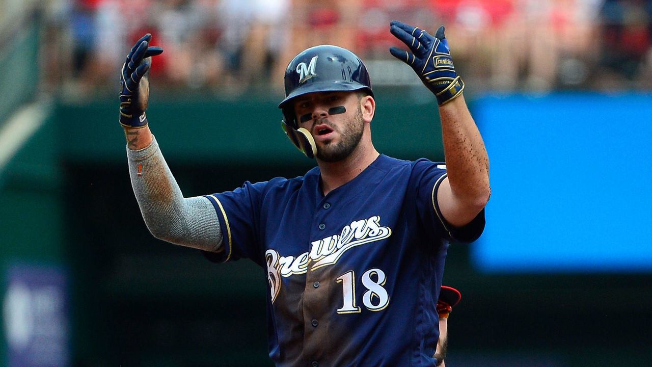 ST LOUIS, MO - AUGUST 19: Mike Moustakas #18 of the Milwaukee Brewers celebrates after hitting a two-run double during the third inning against the St. Louis Cardinals at Busch Stadium on August 19, 2018 in St Louis, Missouri.