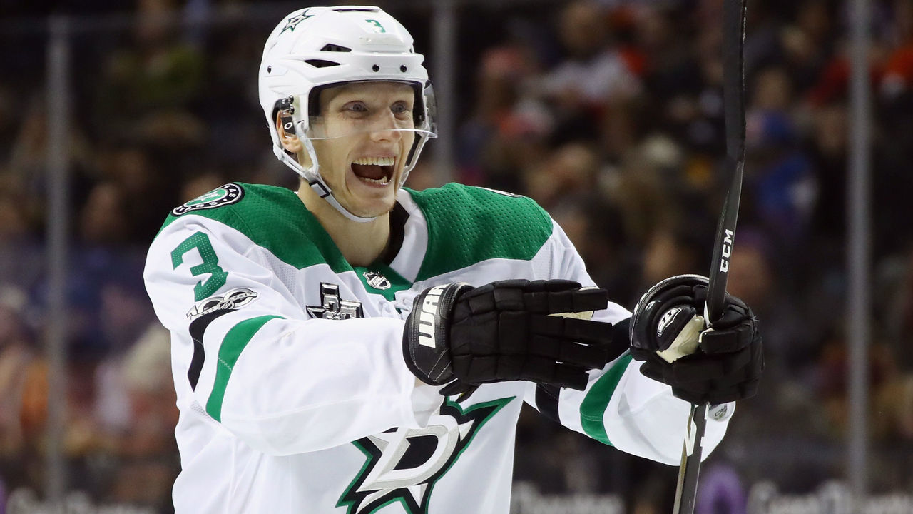 NEW YORK, NY - DECEMBER 13: John Klingberg #3 of the Dallas Stars celebrates a goal by Tyler Pitlick #18 at 21 seconds of the third period against the New York Islanders at the Barclays Center on December 13, 2017 in the Brooklyn borough of New York City.