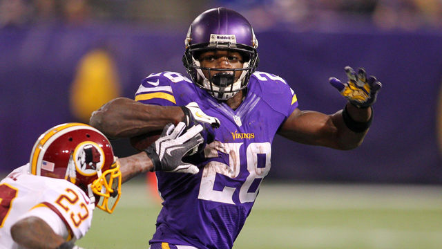 MINNEAPOLIS, MN - NOVEMBER 7: Adrian Peterson #28 of the Minnesota Vikings out runs DeAngelo Hall #23 of the Washington Redskins on November 7, 2013 at Mall of America Field at the Hubert Humphrey Metrodome in Minneapolis, Minnesota.