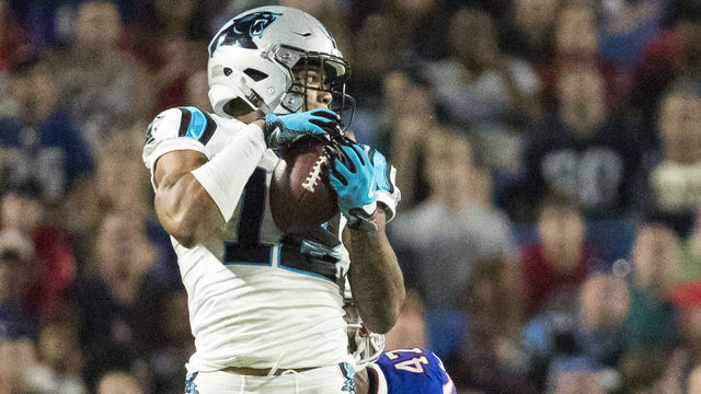ORCHARD PARK, NY - AUGUST 09: DJ Moore #12 of the Carolina Panthers makes a leaping first down reception during the second half against the Buffalo Bills at New Era Field on August 9, 2018 in Orchard Park, New York. Carolina defeats Buffalo in the preseason game 28-23.