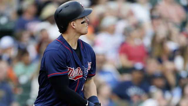 DETROIT, MI - AUGUST 11: Tyler Austin #31 of the Minnesota Twins watches his two-run home run against the Detroit Tigers during the fifth inning at Comerica Park on August 11, 2018 in Detroit, Michigan.