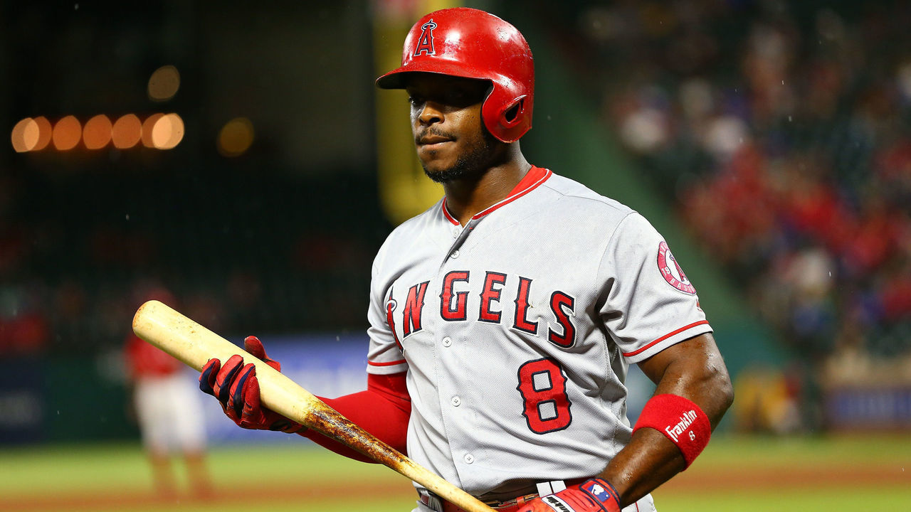 ARLINGTON, TX - AUGUST 18: Justin Upton #8 of the Los Angeles Angels of Anaheim reacts after striking out in the second inning against the Texas Rangers at Globe Life Park in Arlington on August 18, 2018 in Arlington, Texas.