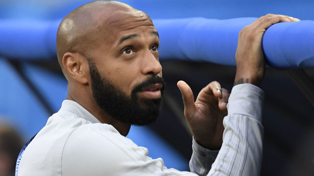 Belgium's French assistant coach Thierry Henry looks on before the Russia 2018 World Cup semi-final football match between France and Belgium at the Saint Petersburg Stadium in Saint Petersburg on July 10, 2018.