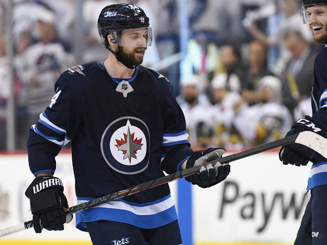 WINNIPEG, MB - MAY 20: Josh Morrissey #44 of the Winnipeg Jets celebrates with Jacob Trouba #8 after scoring a first period goal against the Vegas Golden Knights in Game Five of the Western Conference Finals during the 2018 NHL Stanley Cup Playoffs at Bell MTS Place on May 20, 2018 in Winnipeg, Canada.