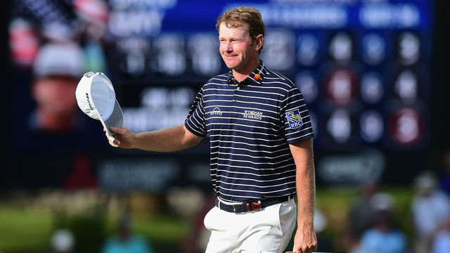 GREENSBORO, NC - AUGUST 19: Brandt Snedeker is introduced as he walks up to the 18th green during the final round of the Wyndham Championship at Sedgefield Country Club on August 19, 2018 in Greensboro, North Carolina.
