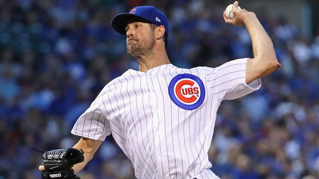 CHICAGO, IL - AUGUST 23: Starting pitcher Cole Hamels #35 of the Chicago Cubs delivers the ball against the Cincinnati Reds at Wrigley Field on August 23, 2018 in Chicago, Illinois.