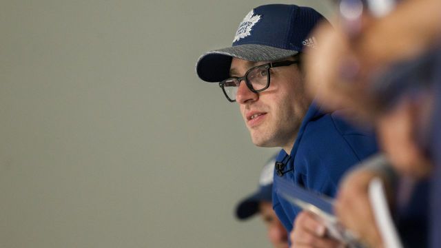 TORONTO, ON - JUNE 28: TML GM Kyle Dubas watches the young guys go through a 25 minute scrimmage. Toronto Maple Leafs hold a scrimmage for recently drafted players at the MasterCard Centre for Hockey Excellence in Etobicoke. Canadian future Hall of Fame inductee, Hayley Wickenheiser, is in camp to help. Also, former NHLer Ryane Clowe (seen behind bench), recently named coach of Newfoundland Growlers of ECHL, new farm team of the Leafs, also works the bench. (Rick Madonik/Toronto Star via Getty Images)