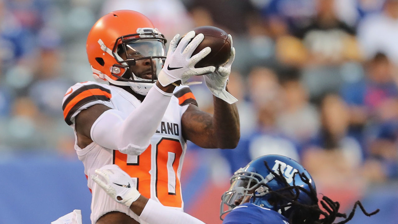 EAST RUTHERFORD, NJ - AUGUST 09: Jarvis Landry #80 of the Cleveland Browns makes the catch as Janoris Jenkins #20 of the New York Giants defends in the first quarter during their preseason game on August 9,2018 at MetLife Stadium in East Rutherford, New Jersey.