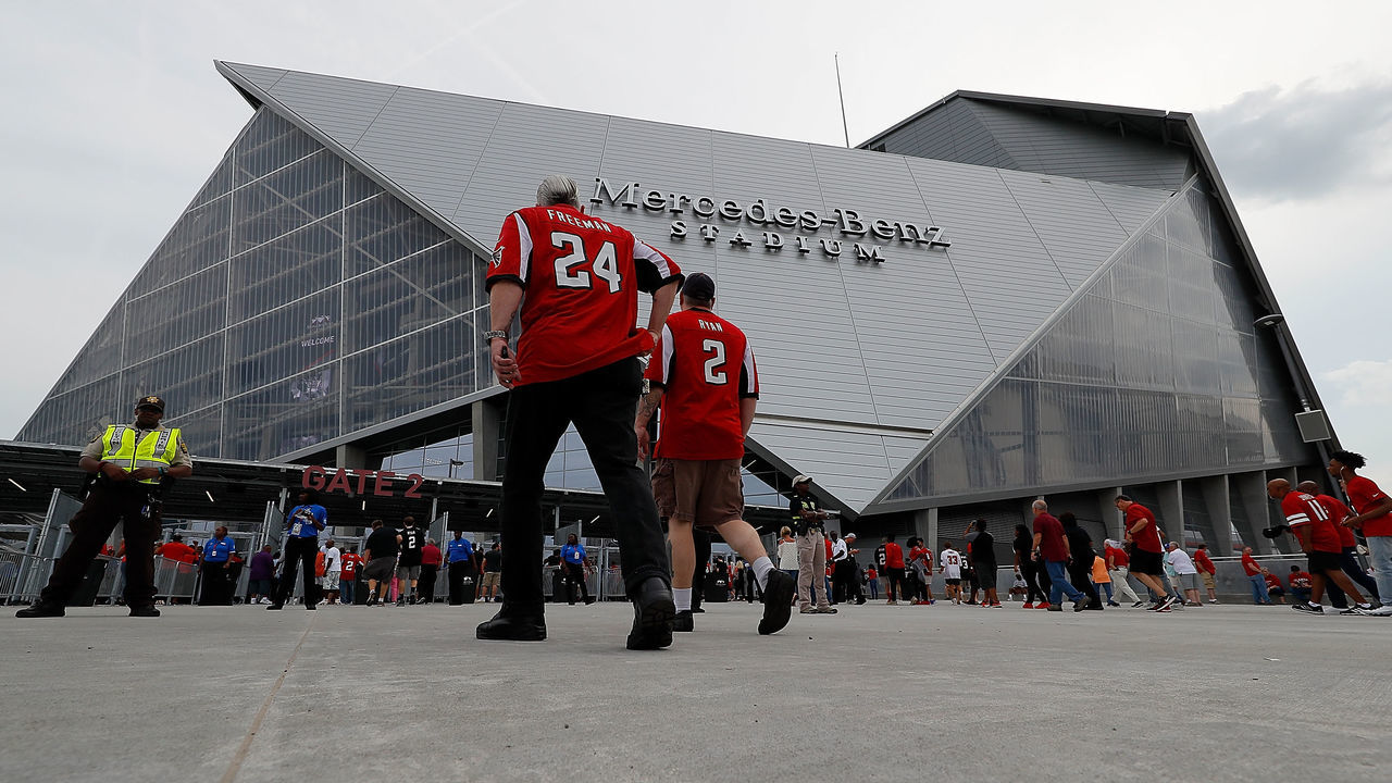 ATLANTA, GA - AUGUST 26: Fans enter the gates prior to the game between the Atlanta Falcons and the Arizona Cardinals at Mercedes-Benz Stadium on August 26, 2017 in Atlanta, Georgia.