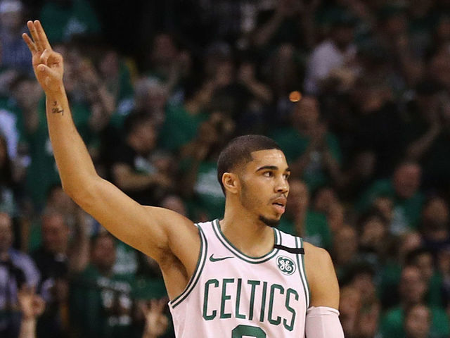 BOSTON, MA - MAY 23: Jayson Tatum #0 of the Boston Celtics gestures in the first half against the Cleveland Cavaliers during Game Five of the 2018 NBA Eastern Conference Finals at TD Garden on May 23, 2018 in Boston, Massachusetts.