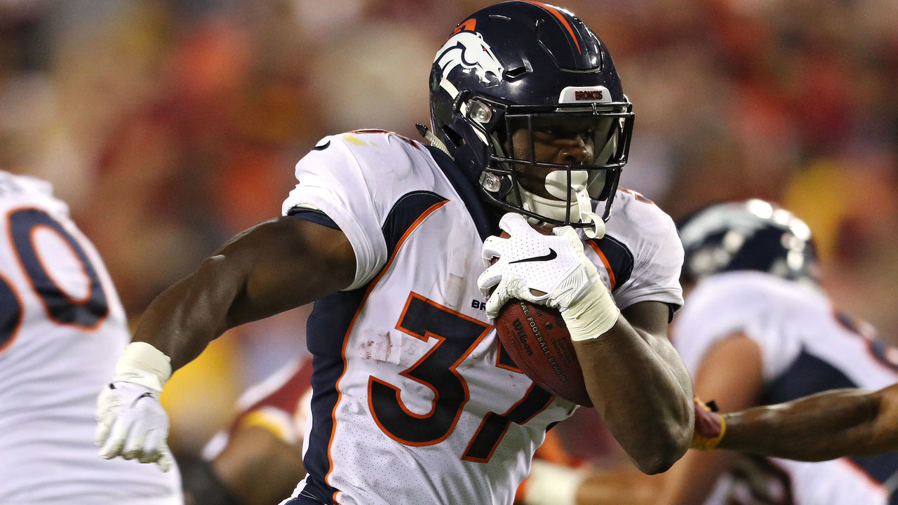LANDOVER, MD - AUGUST 24: Running back Royce Freeman #37 of the Denver Broncos rushes for a touchdown against the Washington Redskins in the first quarter during a preseason game at FedExField on August 24, 2018 in Landover, Maryland.