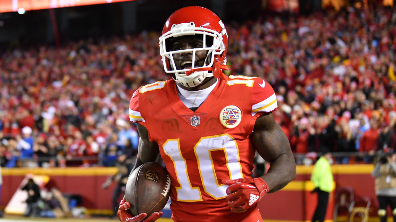 KANSAS CITY, MO - DECEMBER 16: Wide receiver Tyreek Hill #10 of the Kansas City Chiefs runs back to the sidelines after a touchdown reception against the Los Angeles Chargers at Arrowhead Stadium on December 16, 2017 in Kansas City, Missouri. ( Photo by Peter Aiken/Getty Images )