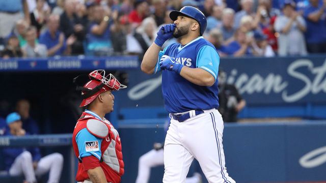 TORONTO, ON- AUGUST 24 - Toronto Blue Jays designated hitter Kendrys Morales (8) crosses home plate after hitting a home run as the Toronto Blue Jays play the Philadelphia Phillies during Players Weekend, where platers wear their nicknames and a patch with a handwritten thank you at Rogers Centre in Toronto. August 24, 2018. (Steve Russell/Toronto Star via Getty Images)