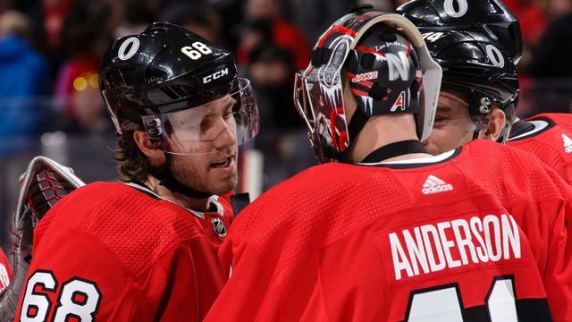 OTTAWA, ON - FEBRUARY 17: Teammates Mike Hoffman #68 and Craig Anderson #41 of the Ottawa Senators celebrate after their win against the New York Rangers at Canadian Tire Centre on February 17, 2018 in Ottawa, Ontario, Canada. *** Local Caption ***