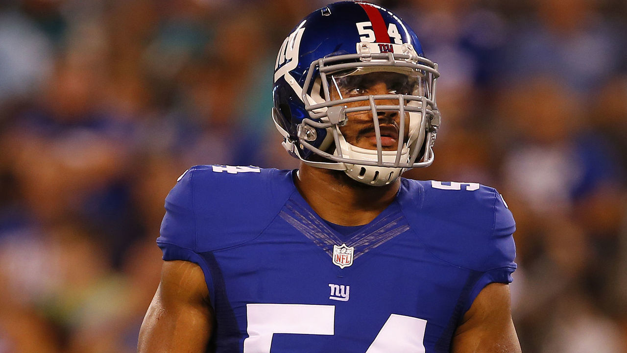 EAST RUTHERFORD, NJ - AUGUST 12: Olivier Vernon #54 of the New York Giants during the first half against the Miami Dolphins in an NFL preseason game at MetLife Stadium on August 12, 2016 in East Rutherford, New Jersey. The Dolphins defeated the Giants 27-10.